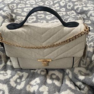 New handbag with tags.